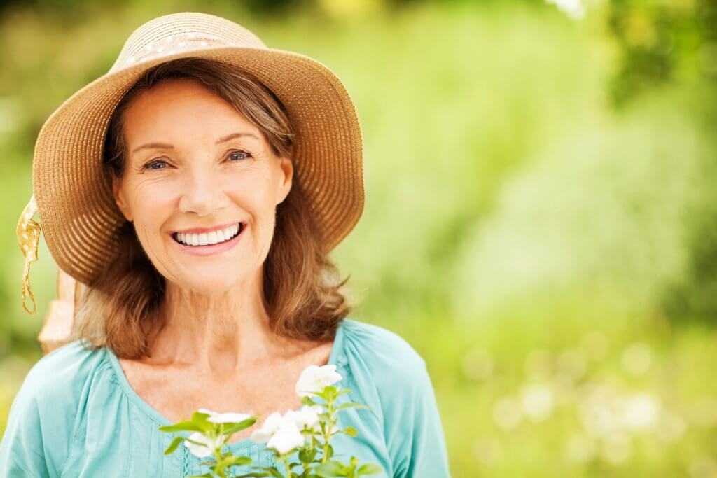 Middle-aged woman enjoying her day outdoors