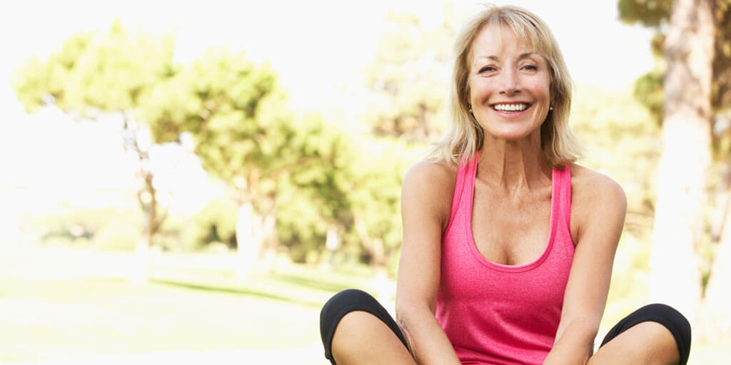 Woman outside doing yoga